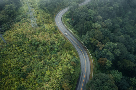 Mountain road in rainy and foggy day,Road to Pai