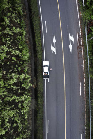 Mountain road in rainy and foggy day,Road to Paiの写真素材