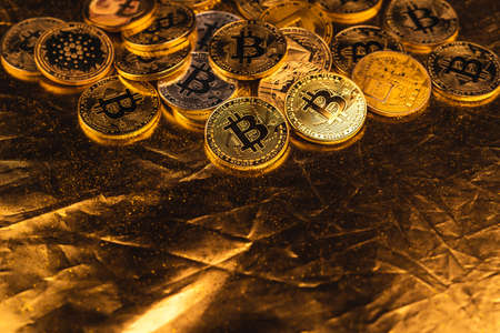 Cryptocurrency Growth Over Stacked Gold Bitcoin Coins black backgroundの写真素材