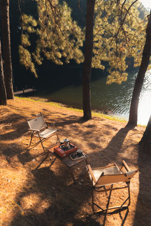 Camping and coffee at Pang Ung in the morning, coffee in the morning under the trees and by the reservoir.の写真素材
