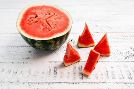 sweet fresh watermelon on white wooden background,red watermelon