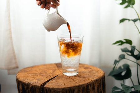 Iced coffee in a cup in the room,iced coffee in a mug at home