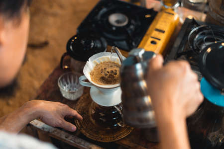 Drip coffee,Close up of hand brewing coffeeの写真素材