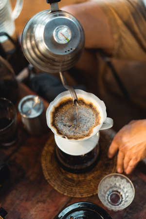 Drip coffee,Close up of hand brewing coffeeの写真素材