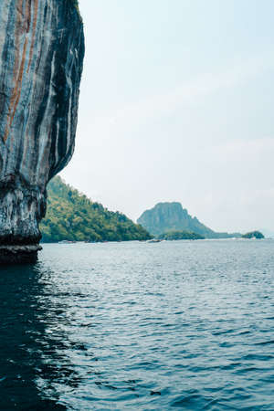 boat tour rocky mountain island in the seaの写真素材