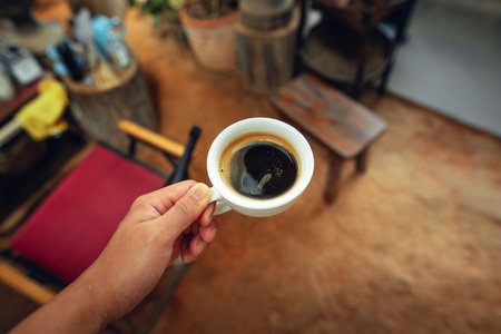 espresso shot pouring out of machineの写真素材