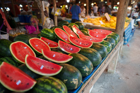 Watermelon for sale at local tropical fruit marketの写真素材