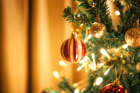 Christmas tree and ball decorations with small lights in the house,Festival backgroundの写真素材