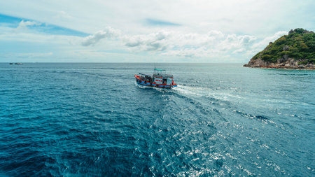 Scuba diving tour boat near the island. Scuba diving tour boat near the island in summer at Koh Tao.の写真素材