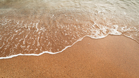 Beach and sea water, tropical beach, small wavesの写真素材