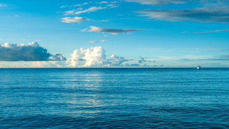 Blue Ocean, Water Surface and Blue Sky,Water background texture. Sea surface in sunset light.の写真素材
