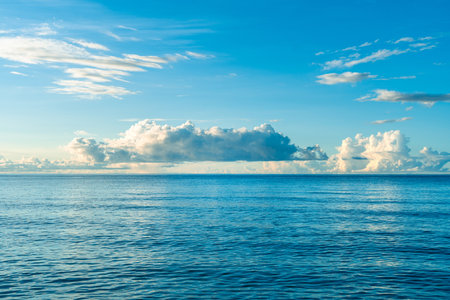 Blue Ocean, Water Surface and Blue Sky,Water background texture. Sea surface in sunset light.の写真素材