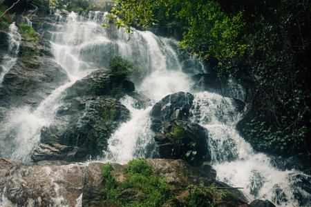 Waterfall landscape in natural forest, watershed and environment in tropical forest of Thailand