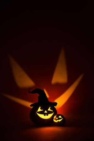 Two jack-o-Lantern at darkの写真素材