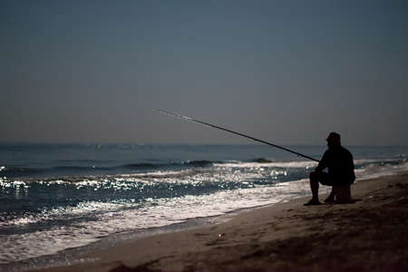 night fishing on the sea in the moonlightの写真素材