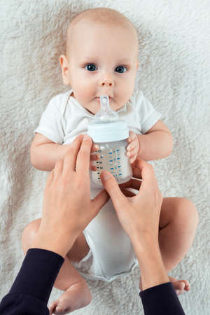 little baby eats from nipplesの写真素材