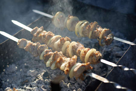 barbecue grills smoke sunlit close-upの写真素材