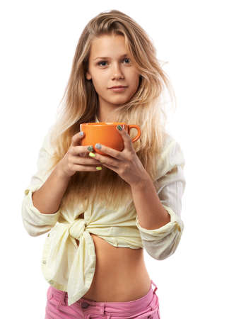 beautiful girl with an orange cupの写真素材