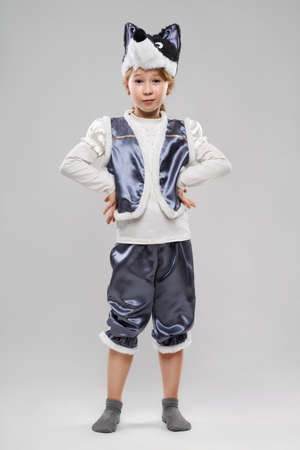 Pretty red-haired girl in a suit of wolf suspectsの写真素材