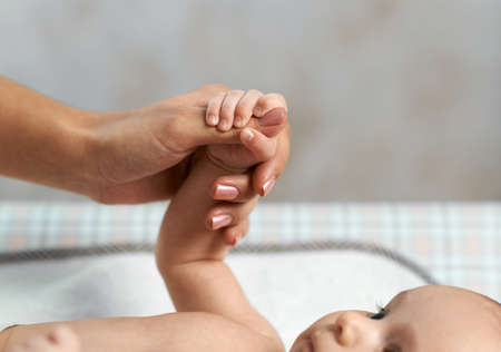 beautiful child hand reflexively grabsの写真素材