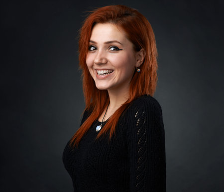 beautiful red-haired girl having fun smiling