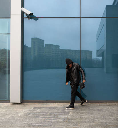 thief stole a purse and runs offの写真素材