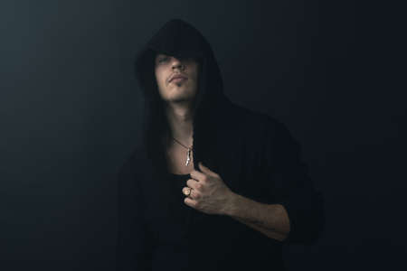 man in a black robe calmの写真素材