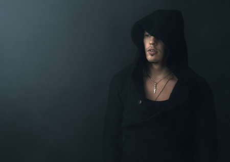 man in a black hoodie upsetの写真素材