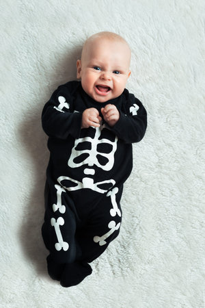 Little baby dressed funny skeleton