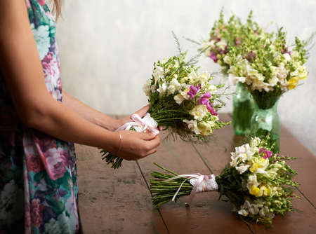Florist make beautiful wedding bouquetsの写真素材