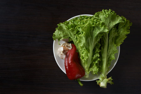 simple vegetables on the black wood table