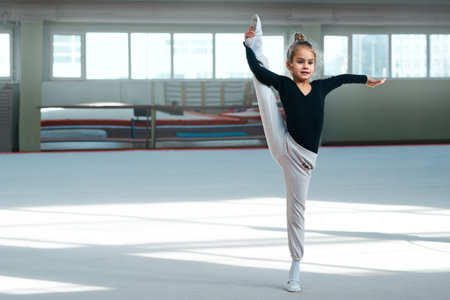 girl doing stretching in Rhythmic Gymnastics