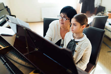 piano lessons at a music schoolの写真素材