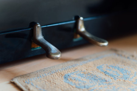 metal pedals piano black closeup