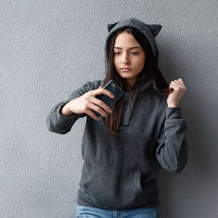 Teen girl making a selfieの写真素材