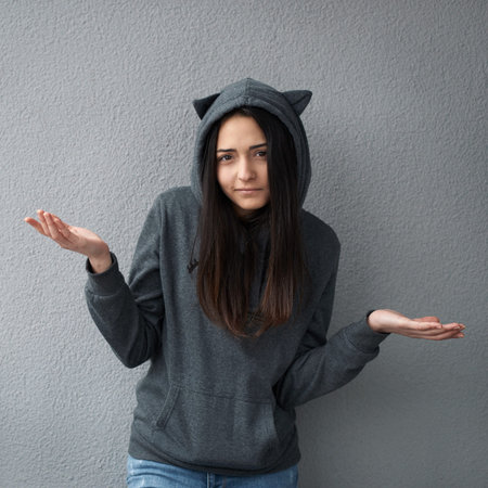 Teen girl does not know the answerの写真素材