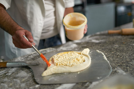 cook yolk wash brush raw Adjarian khachapuriの写真素材