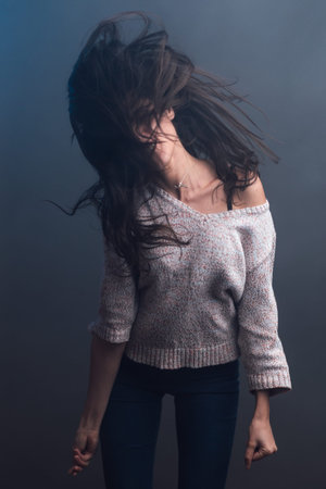 smiling girl on gray background