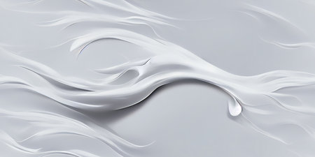 a white liquid that is flowing and has an unrepentantly creamy texture.の写真素材