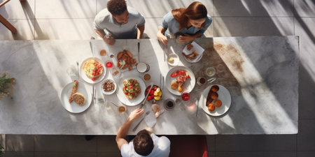 Overhead view of a family during breakfast time.の素材