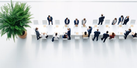 Professionals gather at a corporate event meeting.の素材