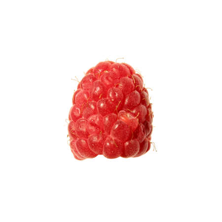 Raspberry isolated on white background. Freshness ripe raspberry closeup. Macro front view sunlight.の写真素材