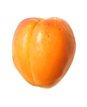 Ripe fresh apricot isolated on whiteの写真素材