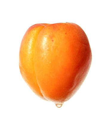 Ripe fresh apricot isolated on whiteの写真素材