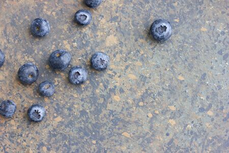 Blueberries. Freshly picked blueberries. Juicy and fresh berries. Bilberry is scattered on the tableの写真素材