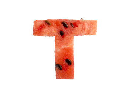 A letter T from a piece of watermelon on a white background. isolatedの写真素材