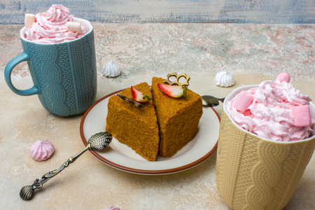Honey cake with strawberries. Dessert on a plate. Light background with place for your text  