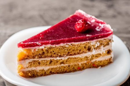 Raspberry cake with white chocolate on a plate. Delicious dessert 1