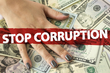 Hand on cash. Finance. Corruption. Illegal transactions 1の写真素材