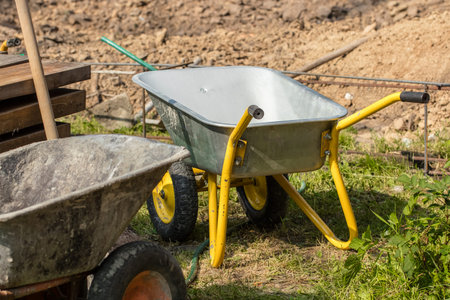 Yellow construction cart on the construction site